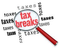 how to find tax breaks magnifying glass 29536914